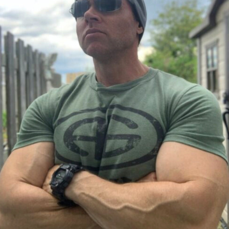 Advanced Genetics owner Chris Johnston wearing AG Army gym T-shirt in heather green.