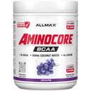 A white tub of Allmax Aminocore BCAA powder in grape flavor, featuring a white label with red and black text and a graphic of purple grapes.