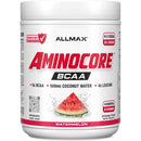 A white plastic tub of Allmax Aminocore BCAA powder in Watermelon flavor, featuring a white label with bold red and black text and a watermelon slice graphic.