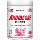 A white plastic tub of Allmax Aminocore BCAA powder in Bubble Gum flavor, featuring a white label with bold red and black text and pink bubble graphics.