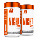 Two white supplement bottles with metallic orange caps and orange-and-white labels reading BALLISTIC NIGHT OPS, shown on a clean white background.