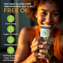 Person holding a supplement tube with health benefits listed on a dark background