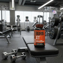 Supplement bottle labeled 'Burn XT' with orange and black design on a white background