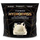 A bag of Nutrabolics Hydromass Vanilla Milkshake protein powder. The packaging is black with gold geometric lines and features a graphic of vanilla ice cream with a flower and milk splash, labeled 'Vanilla Milkshake'.