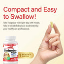Hand holding a capsule with Nutridom Berberine 1000 supplement bottle and text about compactness and ease of swallowing.