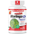 A white plastic bottle of Nutridom Premium Moringa 4x Concentrated Extract dietary supplement, featuring a white cap and a label with red, blue, and green accents, set against a plain white background.