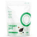 A stand-up pouch of raw vegan pro chocolate hazelnut protein powder, featuring a white background with green text, a green circular graphic, and illustrations of chocolate and hazelnuts.