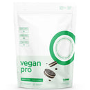 A stand-up pouch of RAW vegan pro cookie cream in vanilla flavor, featuring a white package with green text, a green circular graphic, and an illustration of a cookie and cookie crumbs.