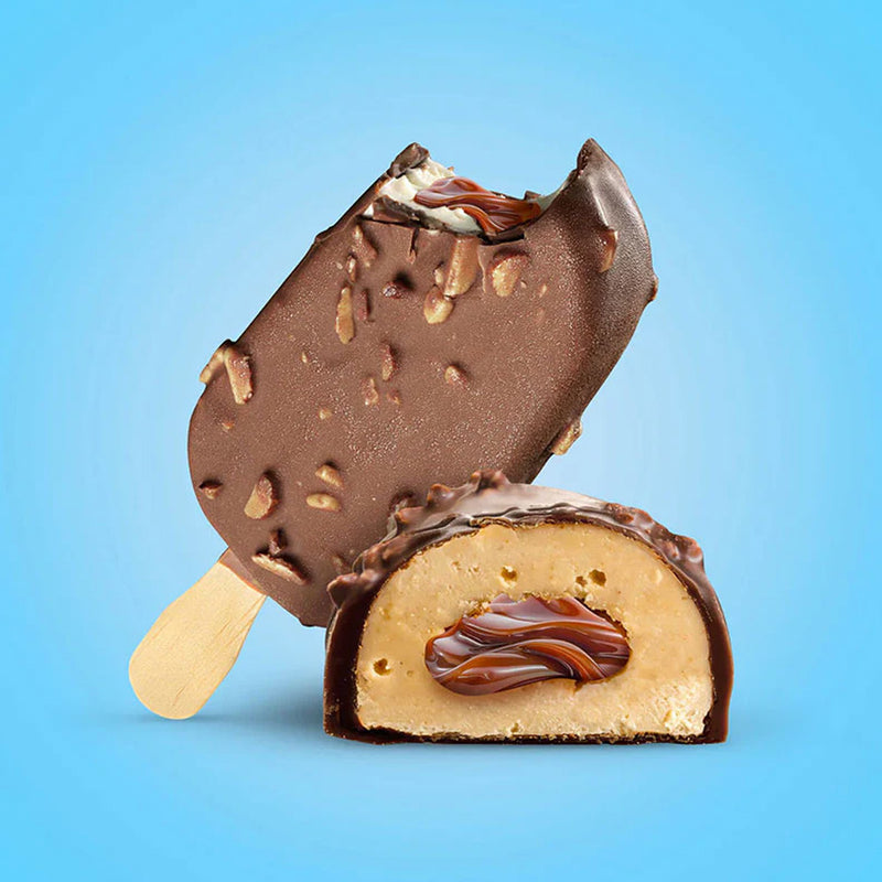 Chocolate-dipped ice cream bar with a peanut butter filling on a blue background