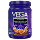 A container of Vega Nut Butter Shake with a chocolate and peanut butter design, indicating it is a plant-based protein supplement.