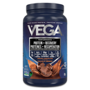 A bottle of Vega Protein + Recovery powder in a berry flavor, highlighting its plant-based protein and recovery properties.