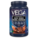 A bottle of Vega Protein + Recovery powder in a berry flavor, highlighting its plant-based protein and recovery properties.