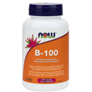 A bottle of NOW Foods B-100 Complex dietary supplement containing 100 Vcaps. The label displays the product name and mentions it is a B Vitamin Supplement.