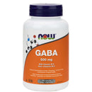 A bottle of NOW Foods GABA 500 mg with B6 dietary supplement containing 100 Vcaps. The label is predominantly white and orange, with scientific illustrations and text detailing the product's benefits and specifications.