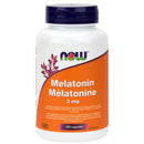 A bottle of NOW Foods Melatonin 3mg with 180 Vcaps. The label is primarily white and orange, with the brand logo and product information displayed.