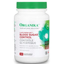 A bottle of Organika Blood Sugar Control supplements with 120 Vcaps. The label is predominantly white with green accents and displays the product name, benefits, and dietary information.