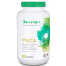 A bottle of Organika Maca 750 mg with 180 veggie caps, predominantly white with green and yellow label, on a white background.